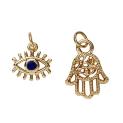 2 guldfärgade hängen charms, hand med strass 15,×12 mm, öga med strass 11×8 mm