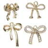 Guldfärgade hängen / charms 4 olika rosetter med pärlor & strass