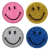 Iron-on tygmärke 4 glittande smileys i 4 olika färger Ø40 mm