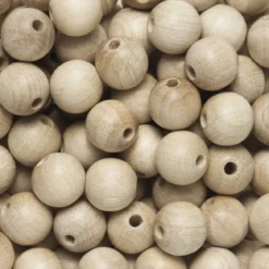Runda träpärlor Ø10 mm, cirka 100 st. naturfärgade / omålade